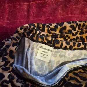 No Boundaries Animal Print Top in Black and Tan